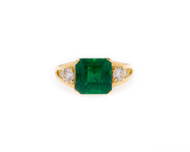 Emerald Split Shank Trilogy Ring