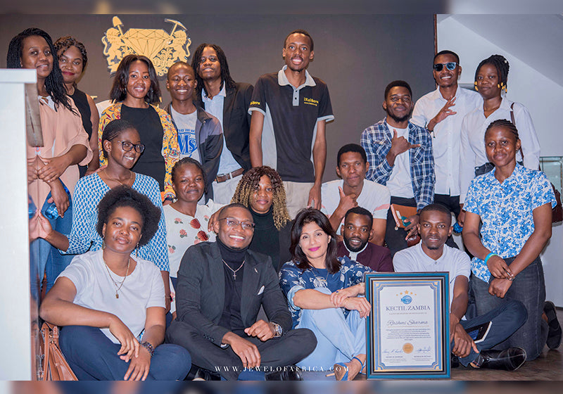 Jewel of Africa CEO, Ms. Rashmi Sharma, with the Kectil Zambia Director, Mr. Rodrick Mutale and a cohort of youths undergoing the Ketcil Entrepreneurship and Leadership training.